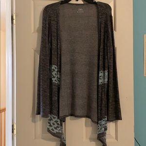 Knitted gray cardigan with blue patterns